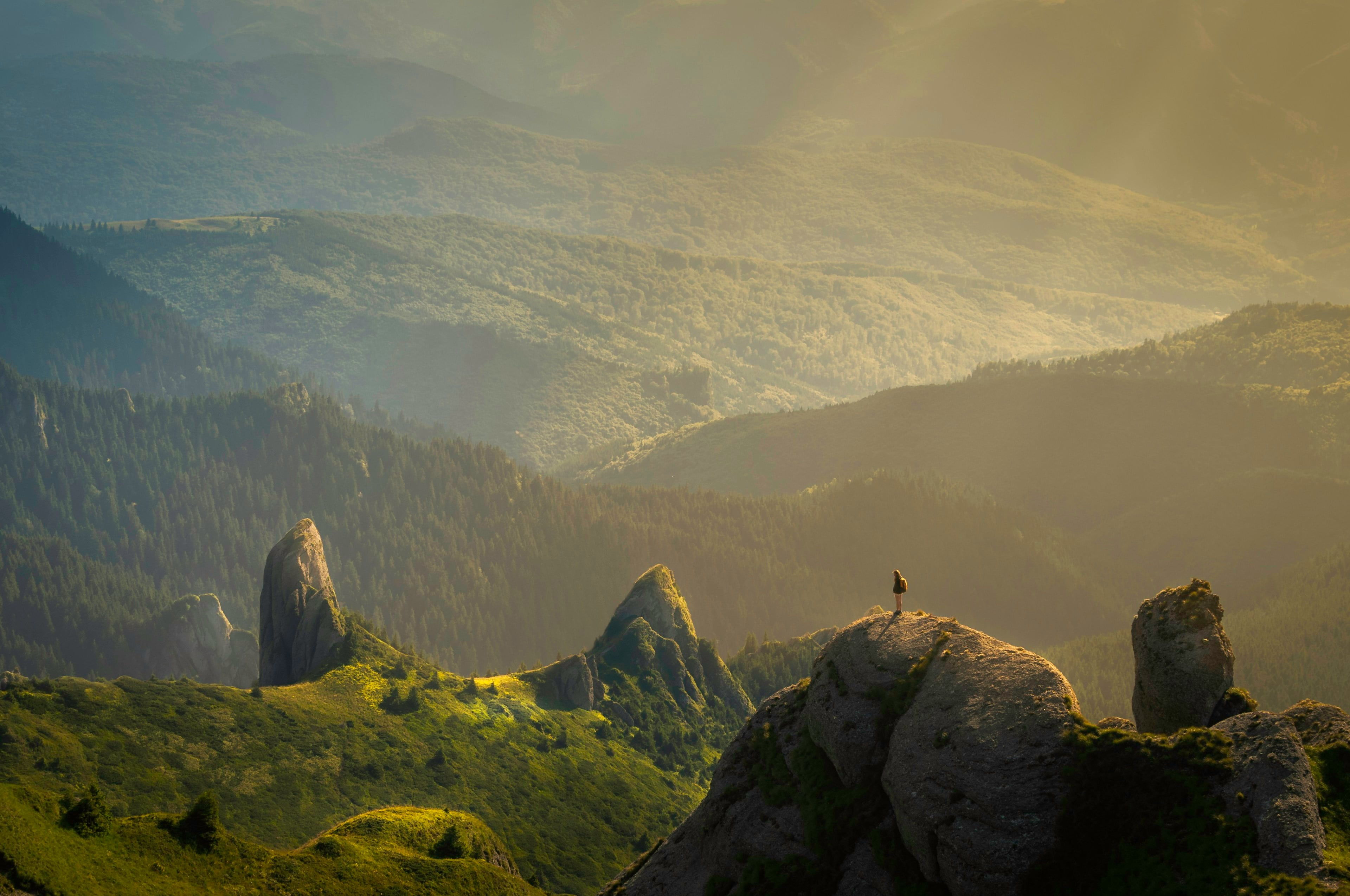 Sunlight breaking over a mountain ridge
